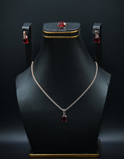 Rose Gold & Ruby Solitaire Jewelry Set With Flower